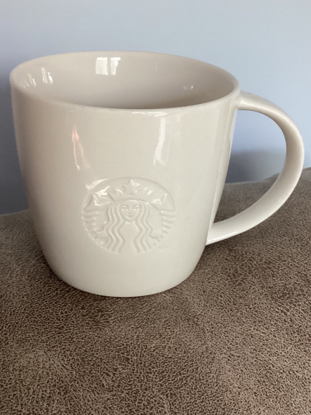 2010 Starbucks embossed siren bone china cream 14 oz mug